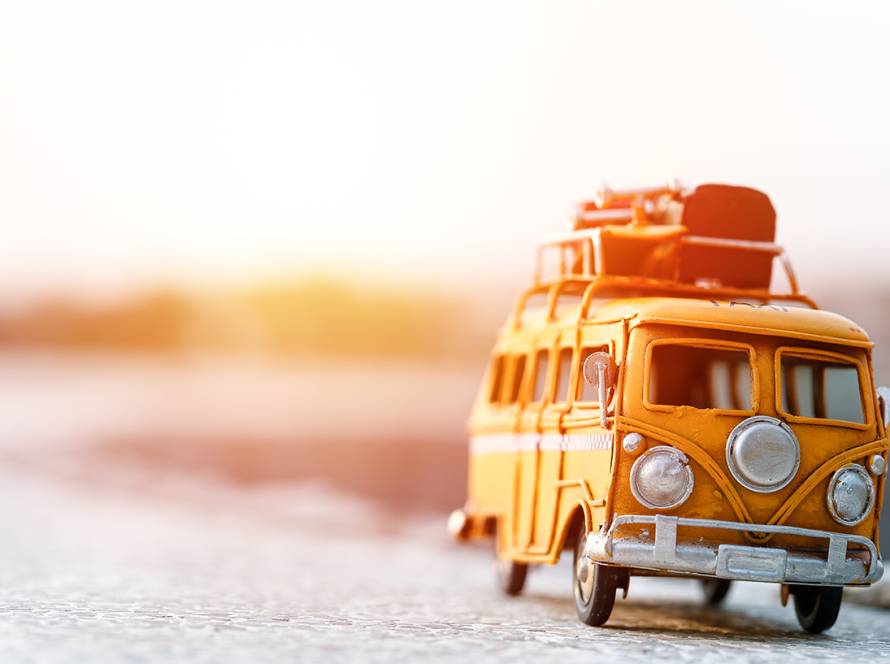 yellow bus on road to rv campground