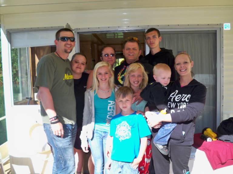 smiling family on rented houseboat