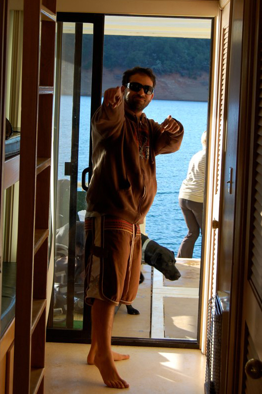 smiling man on shasta lake houseboat