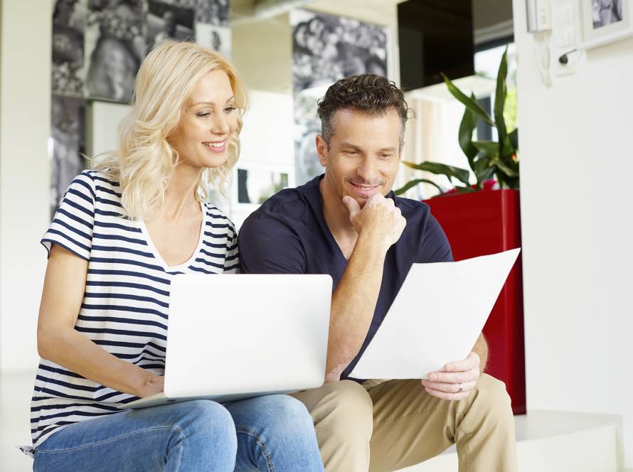 smiling couple reviews cost of houseboats