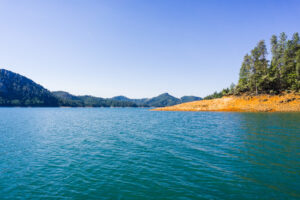 Shasta Lake, McCloud River Arm landscape on a sunny summer morning, Northern California